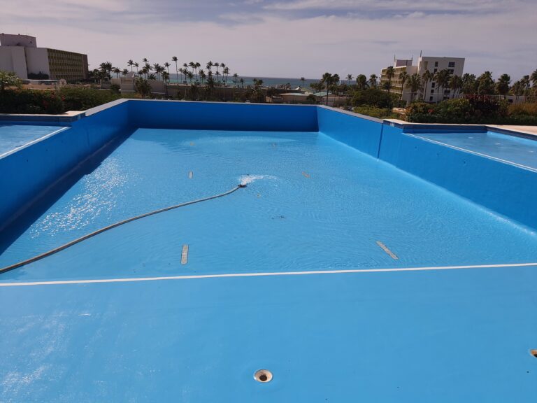Impermeabilización con poliurea y acabado poliaspártico: vaso de piscina – registro de obra 10, Aruba