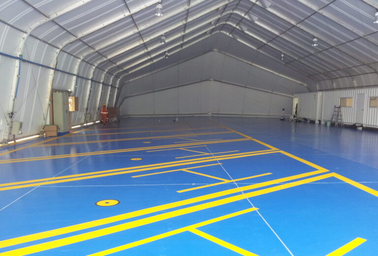 Piso epóxico con demarcación en un hangar de aviación de Melgar (Tolima) – foto 1