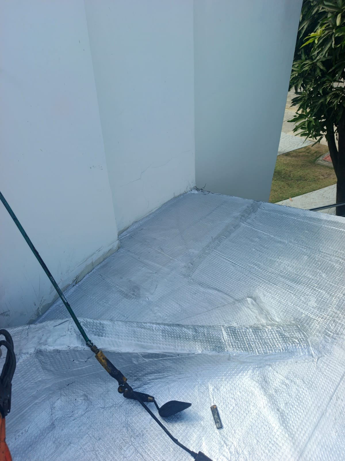 Detalle remate manto foil con soplete